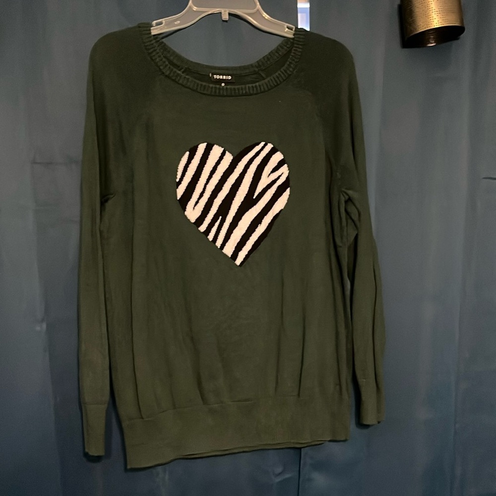 Dark green sweater with zebra print heart